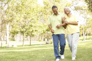 happy senior couple taking a walk